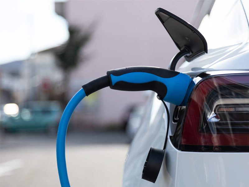 Charger plugged into an electric vehicle for sale at Murray Ford of Kingsland dealership in Kingsland, GA